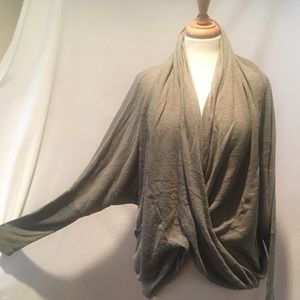 Free People Soft light criss cross front sweater.